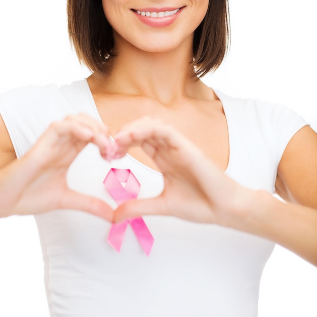 healthcare, medicine and breast cancer concept - woman with pink cancer ribbon