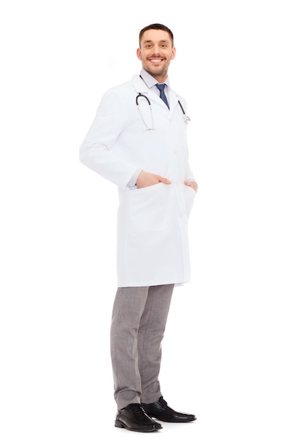 healthcare, profession and medicine concept - smiling male doctor with stethoscope in white coat over white background