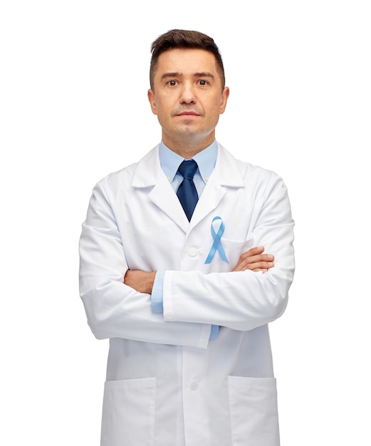 healthcare, profession, people and medicine concept - male doctor in white coat with sky blue prostate cancer awareness ribbon