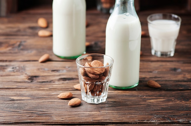 Healthy Almond milk on the wooden table