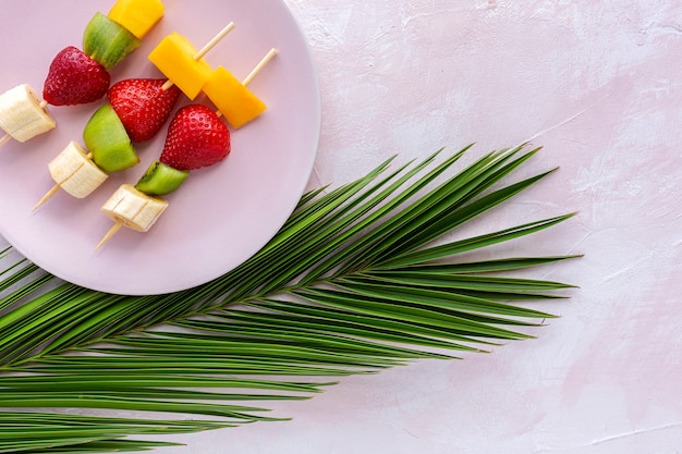 Healthy assorted fruit skewers from above