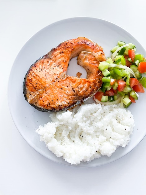 Healthy balanced meal lunch plate baked salmon