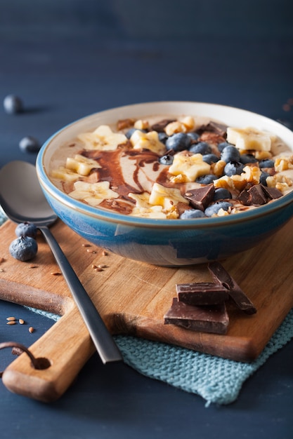 Healthy banana smoothie bowl with blueberries