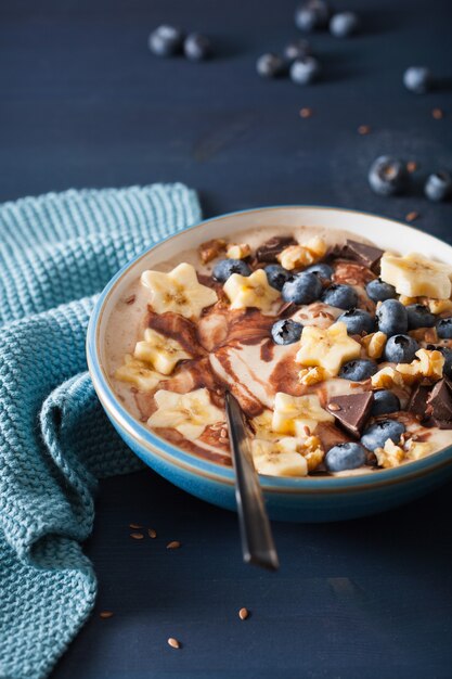 Healthy banana smoothie bowl with blueberries