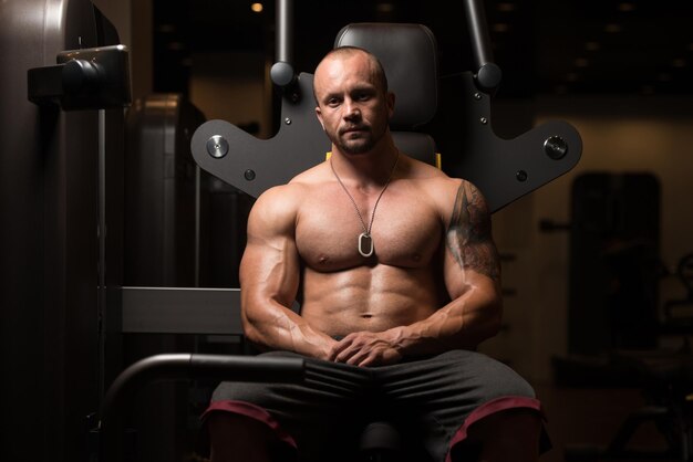 Healthy Bodybuilder Resting In Healthy Club After Exercising