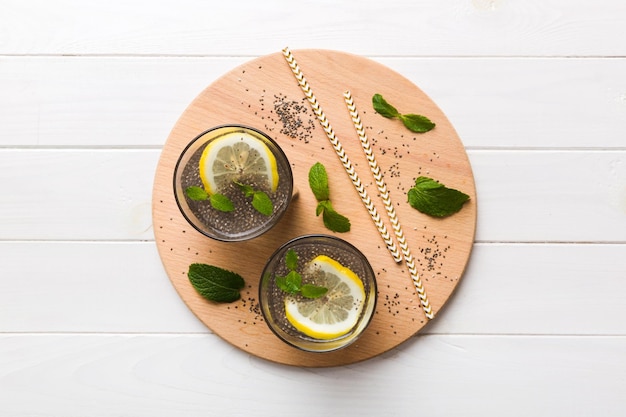 Healthy breakfast or morning with chia seeds lemon and mint on table background vegetarian food diet and health concept Chia pudding with lemon and mint