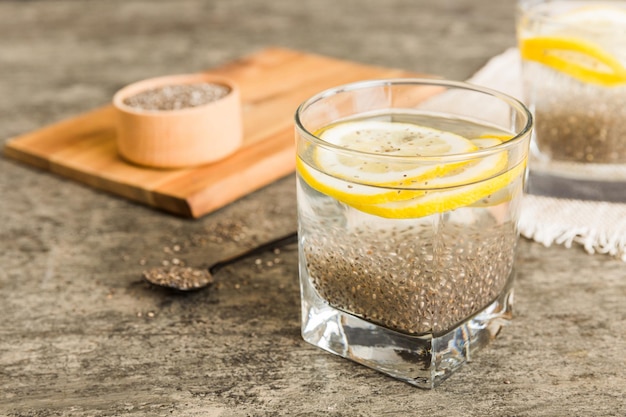 Healthy breakfast or morning with chia seeds and lemon on table background vegetarian food diet and health concept Chia pudding with lemon