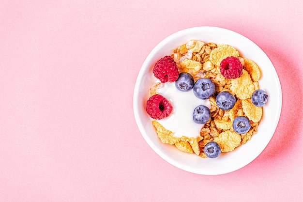 Healthy breakfast, muesli, cereal with fruit, top view.