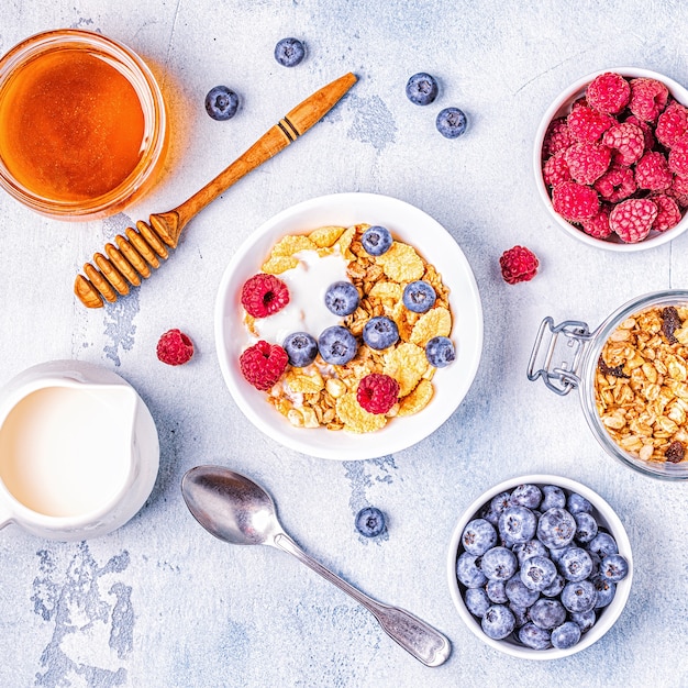 Healthy breakfast, muesli, cereal with fruit, top view.