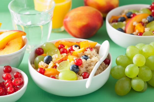 Healthy breakfast quinoa with fruits berry nectarine blueberry grape