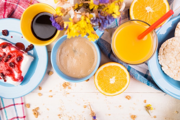 Healthy Breakfast. Various Assortment Set. Orange Juice, Granola, Coffee and Fruit.