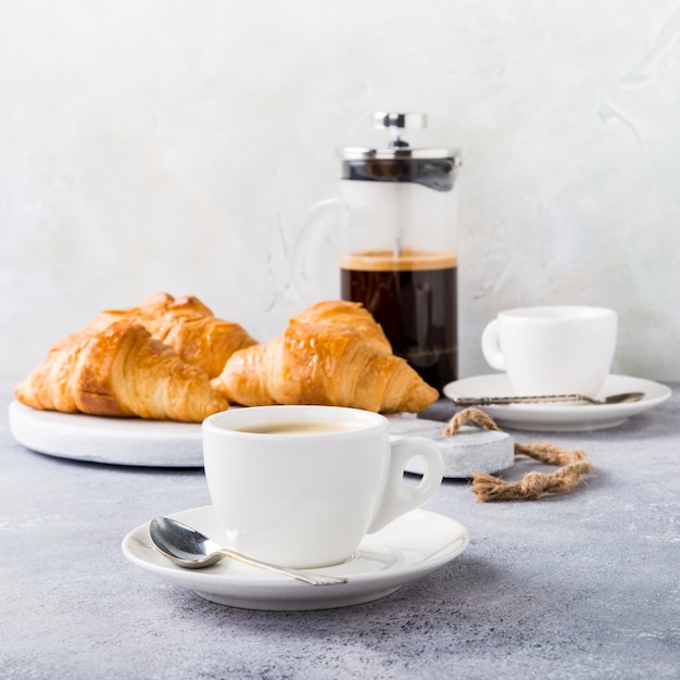 Healthy breakfast with coffee and croissants