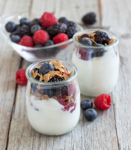 Healthy breakfast with Fresh greek yogurt, muesli and berries