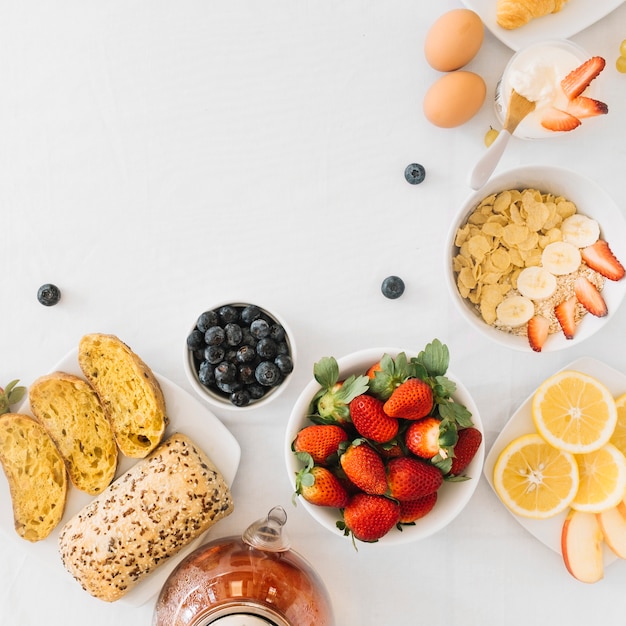 Healthy breakfast with fruits on white background