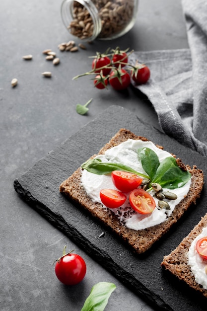 Healthy breakfast with toast and tomatoes high view