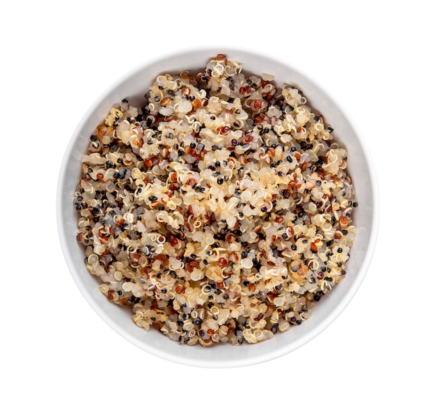 Healthy colorful cooked quinoa isolated on white. top view