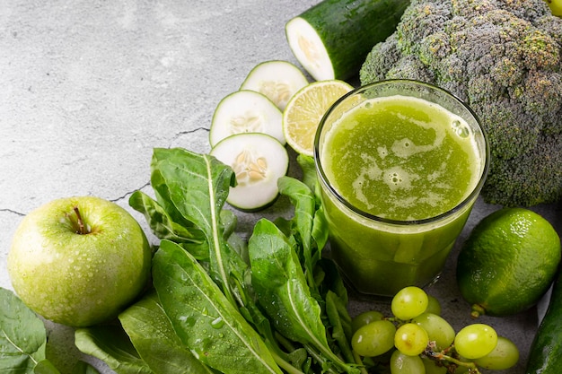 Healthy detox smoothie with cucumber broccoli green apple kale and green grapes Detox drink