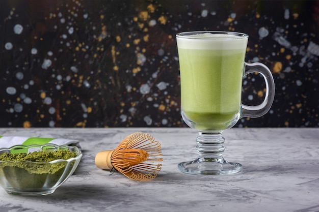 Healthy drink with owl milk. Matcha green tea latte. Vegetarian product