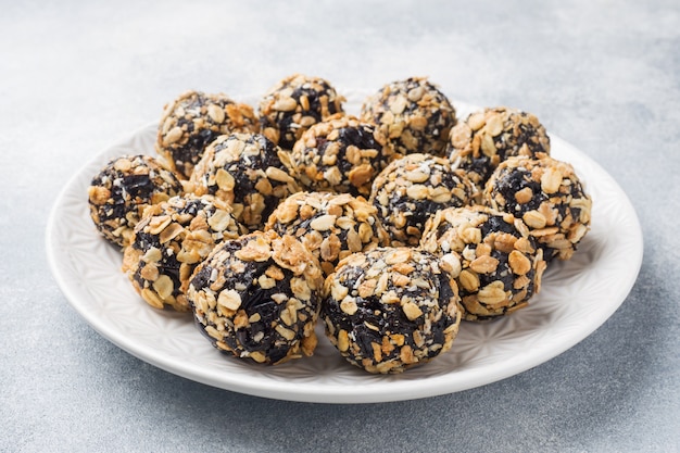 Healthy energy balls made of dried fruits and nuts with oatmeal and muesli 