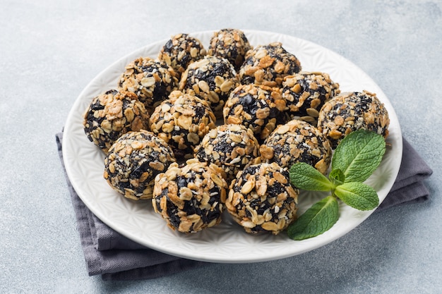 Healthy energy balls made of dried fruits and nuts with oatmeal and muesli