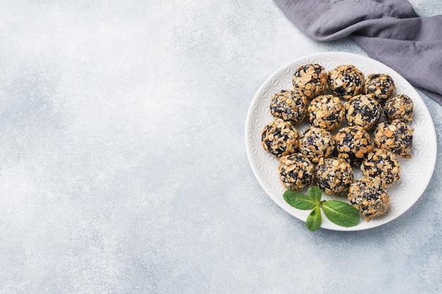 Healthy energy balls made of dried fruits and nuts with oatmeal and muesli