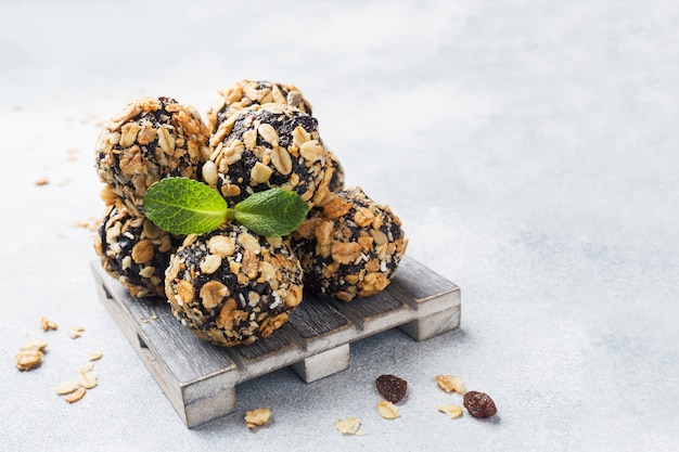 Healthy energy balls made of dried fruits and nuts with oatmeal and muesli