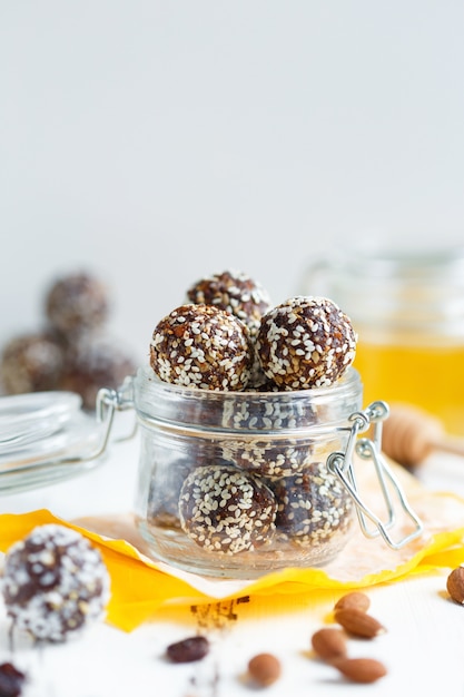 Healthy energy organic bites with nuts, dates, honey and sesame