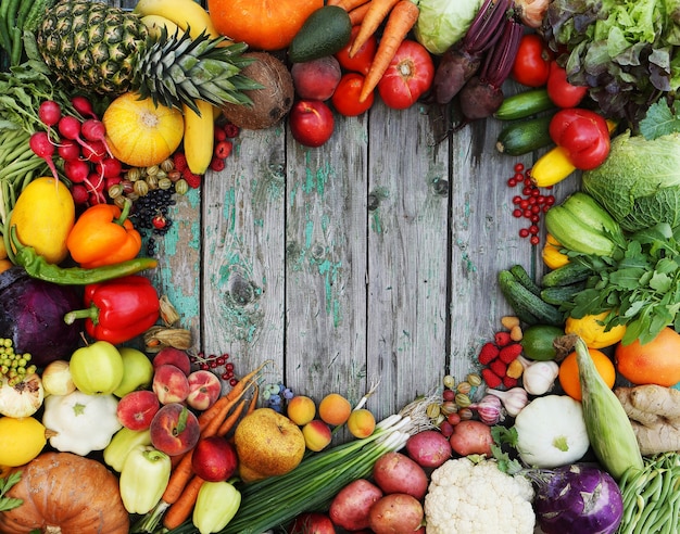 Healthy food background. different fruits on wooden table.