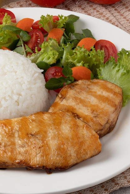 Healthy food concept Delicious grilled chicken rice and salad plate