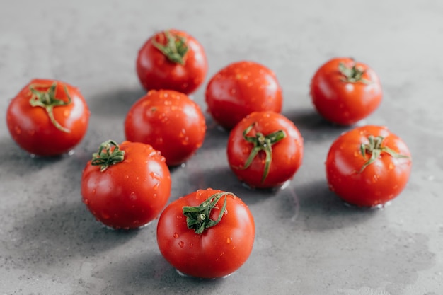 Healthy food concept Fresh red cherry tomatoes with drops of dew ready for eat Juicy tasty vegetables ingredients for healthy salad