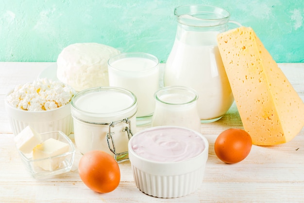 Healthy food concept. Set of dairy products  light blue & white wooden background