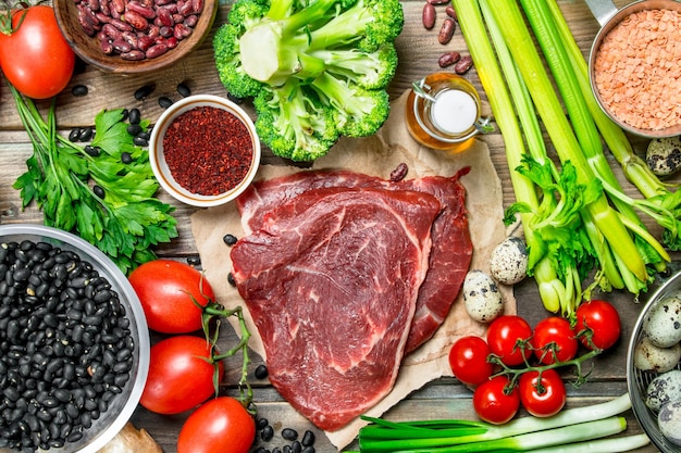 Healthy food Variety of organic food with raw beef meat