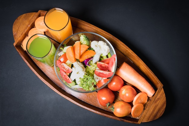 Healthy foods are on the table, Fresh vegetable salad in a glass bow