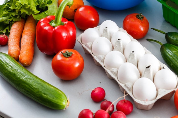 healthy foods are on the table in the kitchen