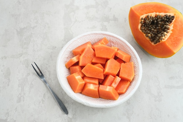 Healthy and fresh cut papaya fruit or sliced papaya, served in a plate