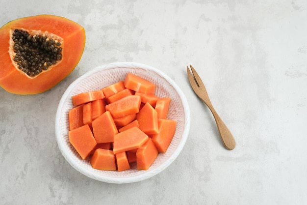 Healthy and fresh cut papaya fruit or sliced papaya, served in a plate