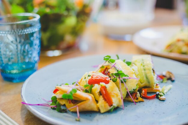 Healthy and fresh homemade egg omelet with colorful vegetables