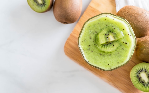 Healthy fresh kiwi smoothie in glass