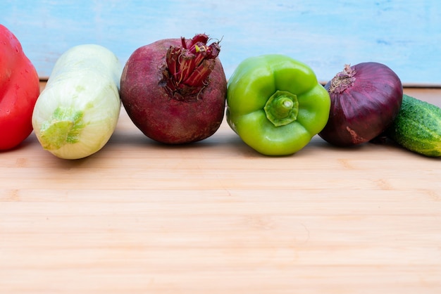 Healthy fresh vegetables on a wooden board for cutting. Healthy lifestyle diet.