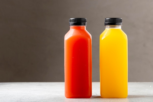 Healthy fruit smoothies in plastic bottles