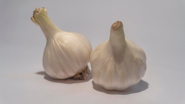 Healthy garlic on a white background Garlic spice on white