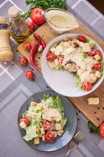 Healthy Grilled Chicken Caesar Salad with Cheese tomatoes and Croutons