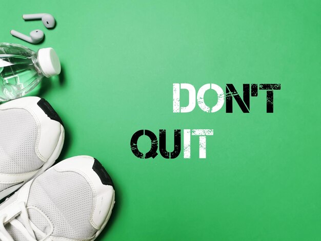 Photo healthy life concept. top view phrase do not quit on green background