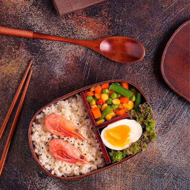 Healthy lunch in wooden japanese bento box