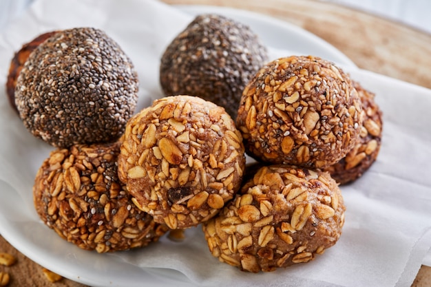 Healthy organic energy balls with muesli, nuts, cocoa, chia and honey