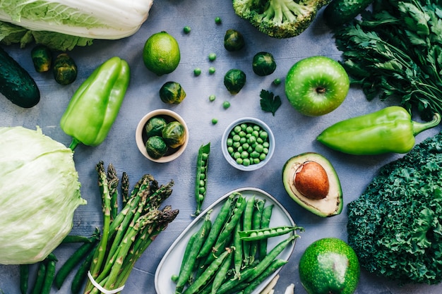 healthy organic green food, assortment of fresh vegetables on the table.