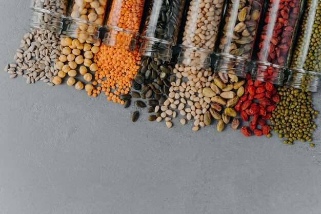 Healthy products in glass jars. Organic grains in containers