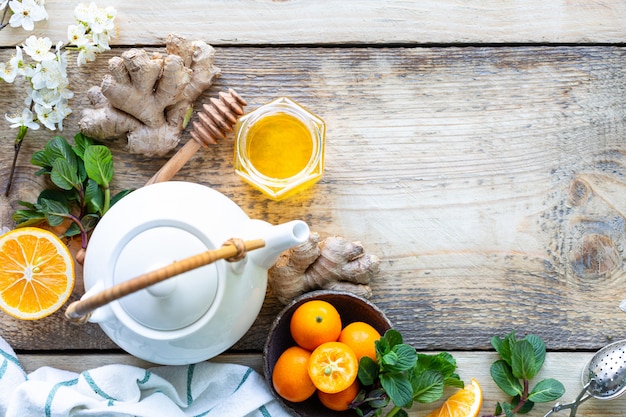 Healthy products for Immunity boosting on wooden background with copy space top view. Lemon, nuts, ginger to immune system