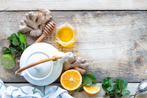 Healthy products for Immunity boosting on wooden background with copy space top view. Lemon, nuts, ginger to immune system