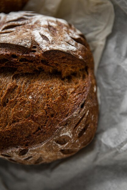 Healthy rye bread slices on the plate on concrete background